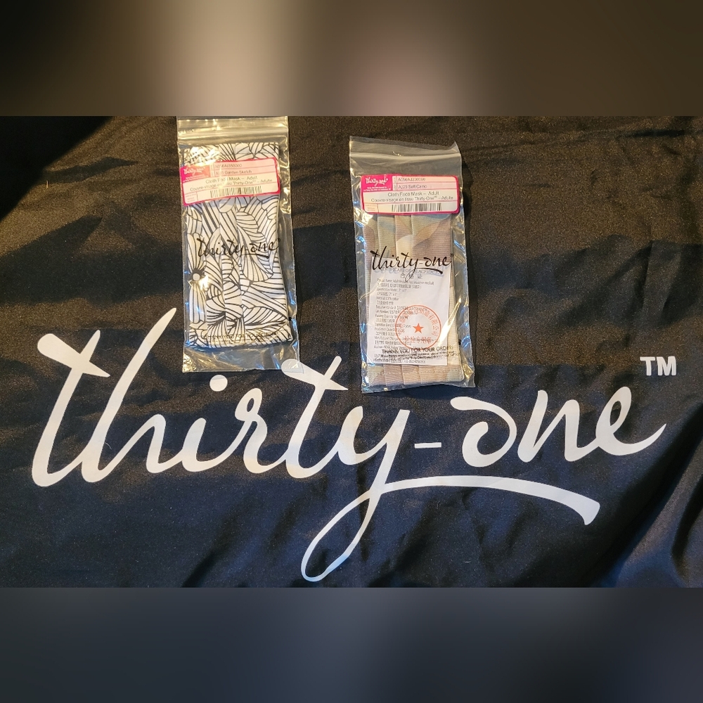 TWO NEW 31 adult Face masks